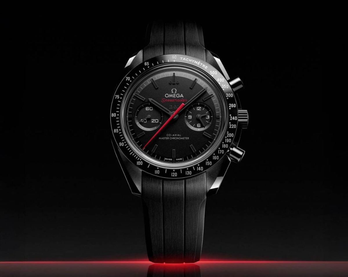 Omegg_a Speedmaster Dark Side of the Moon black white Red niddle